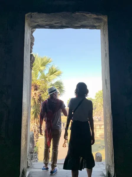 rear-view-couple-entrance-historic-building
